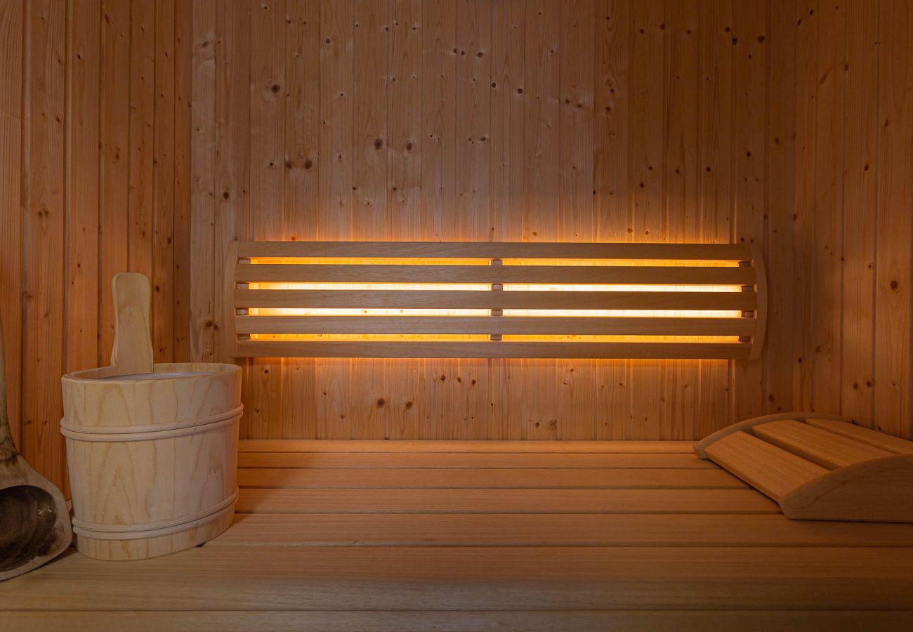 view into the sauna in the holiday home Grimming Lodge Distel in Tauplitz