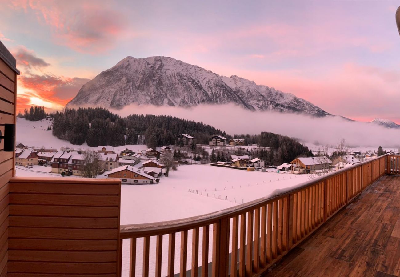 Terrace with an seating area in the holiday home flat Penthouse Grimming Adler Lodge D7.1 in Tauplitz