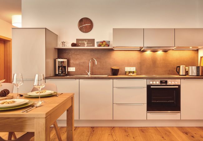 Kitchen in the holiday home flat Adler Lodge D3 in Tauplitz