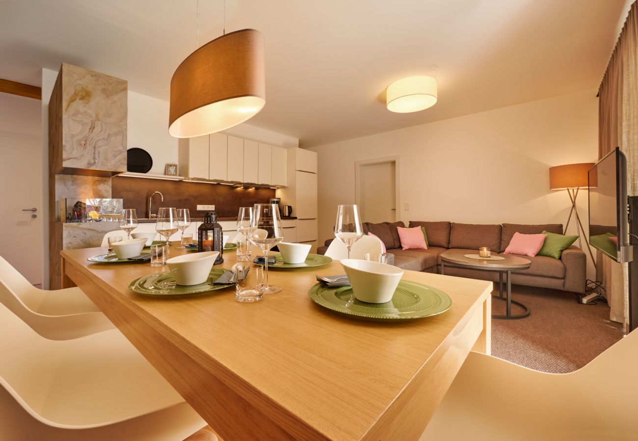Dining table set in the cosy kitchen in the Alm Lodge A3 holiday home flat in Tauplitz