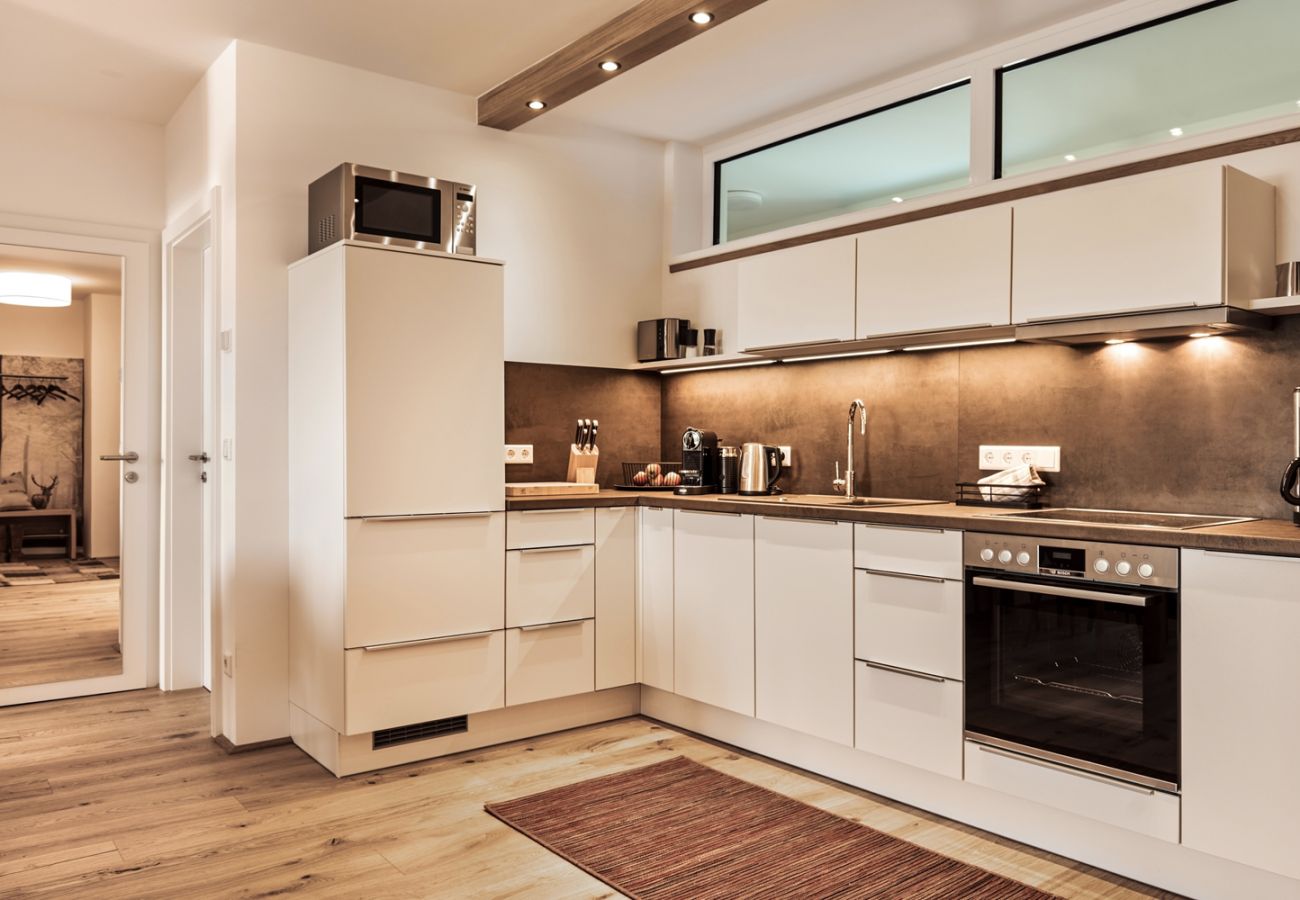 Kitchen in Holiday Home Wasserfall Lodge C2 in Tauplitz