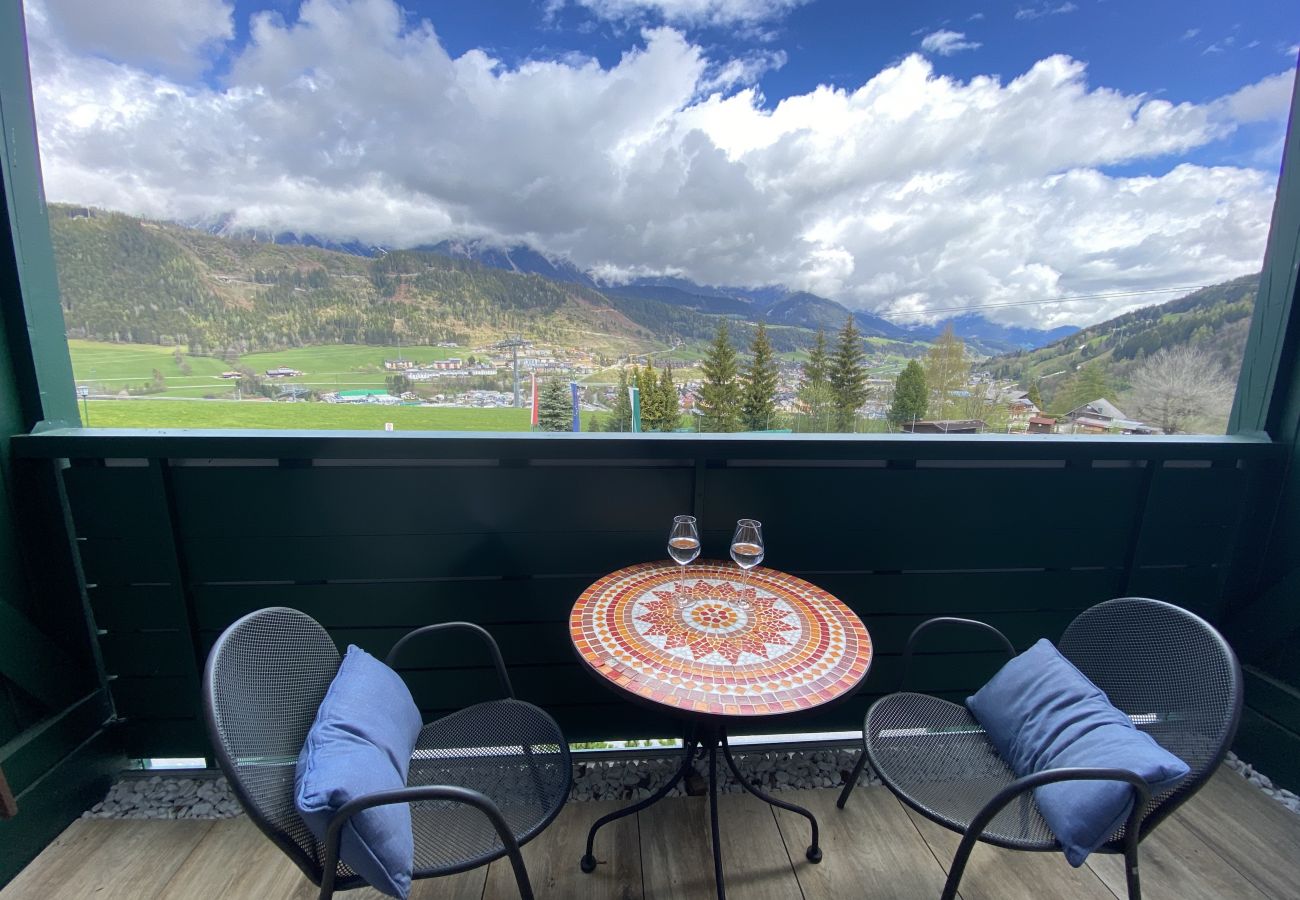 Terrace with an seating area in the holiday home flat Alpine Studio Apartment in the Schladming Dachstein Region