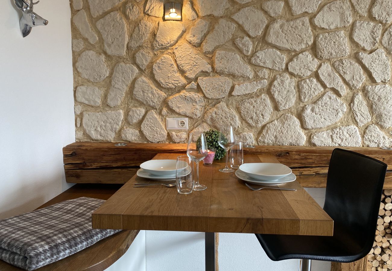 Dining table set in the holiday home flat Alpine Studio Apartment in the Schladming Dachstein Region